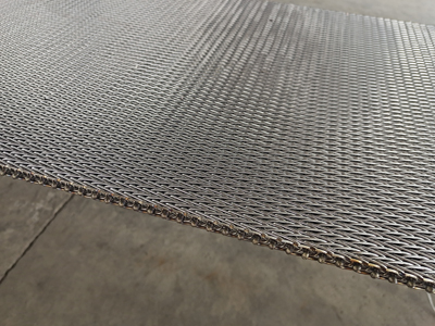 Compound weave conveyor belt with welded edge